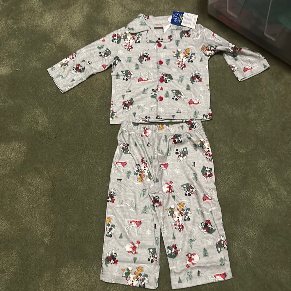 Disney 2 Piece poly/flannel infant’s winter/cChristmas Pajamas. NWT 18 months